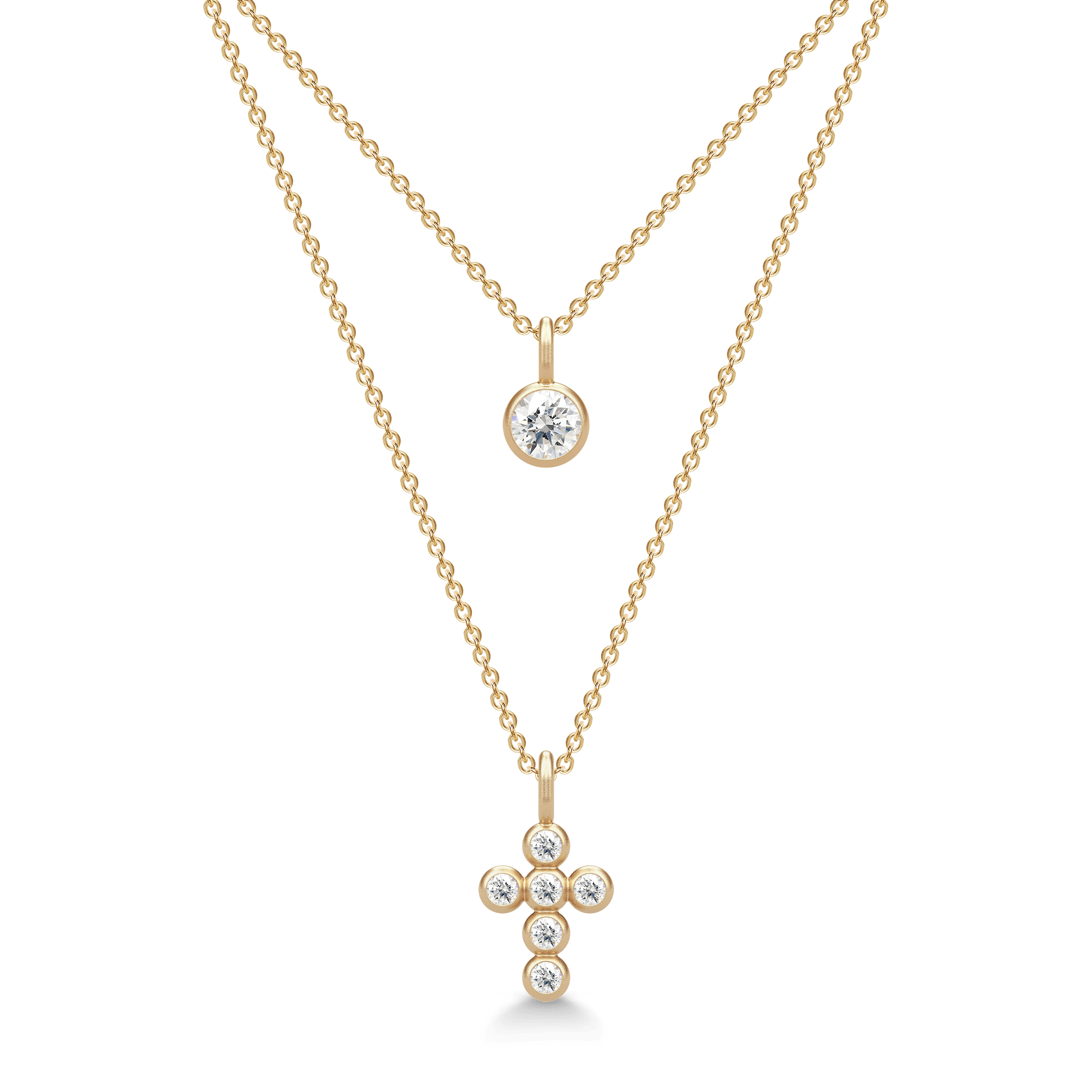 Pure Pendant med hvid Topaz vist lagdelt med et diamantbesat korsvedhæng i guld